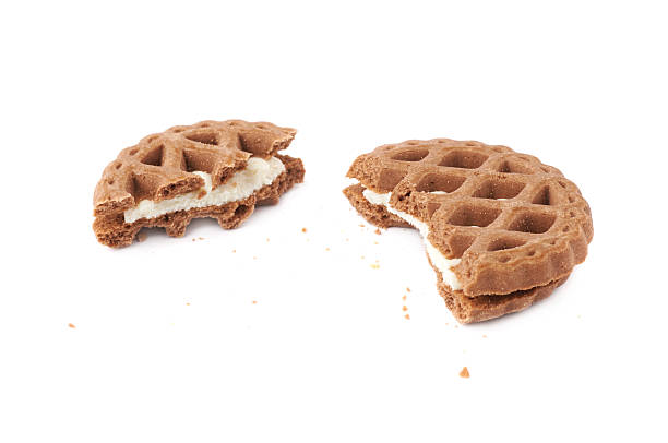 istock Broken into pieces cookie isolated over the white background 626788580