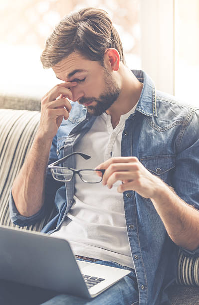 istock Handsome businessman at home 626788698