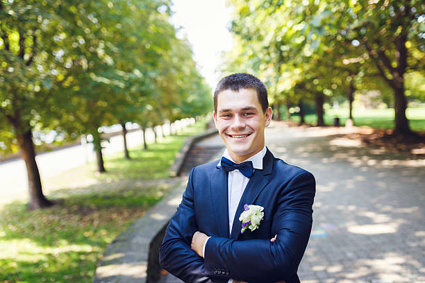 istock Happy groom in a park 626789666