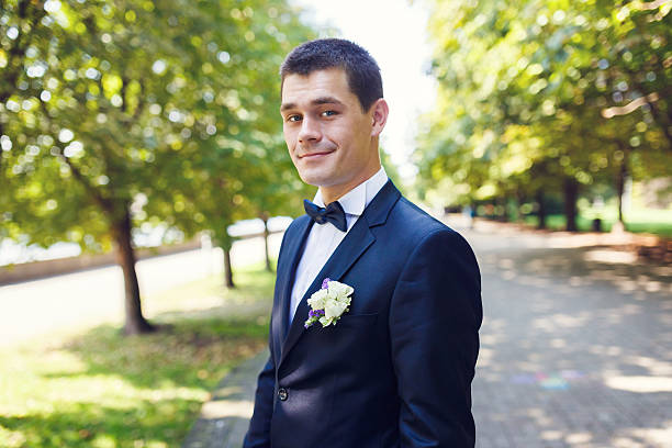 istock Happy groom in a park 626789814
