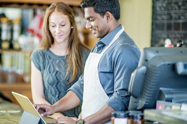istock Training a New Employee at a Cafe 626790876