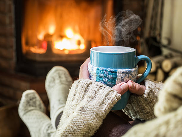istock Warming and relaxing near fireplace. 626799172