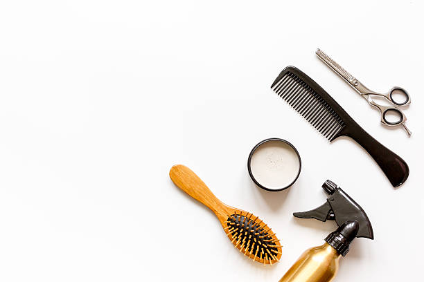 istock combs and hairdresser tools on white background top view 626799484