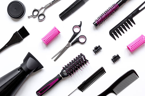 istock combs and hairdresser tools on white background top view 626799602