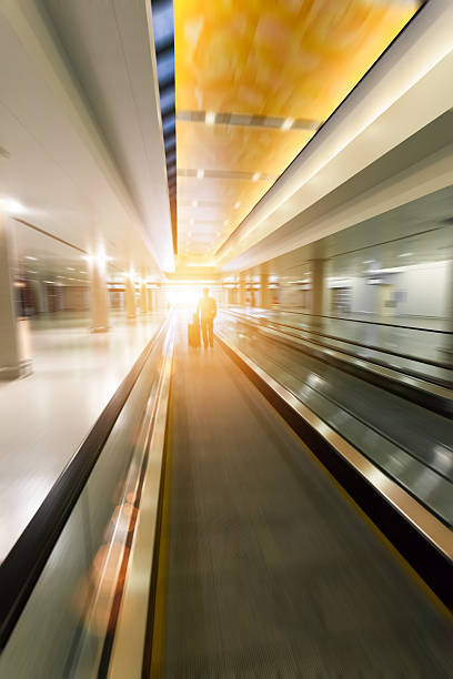 istock moving escalator in airport 626804780
