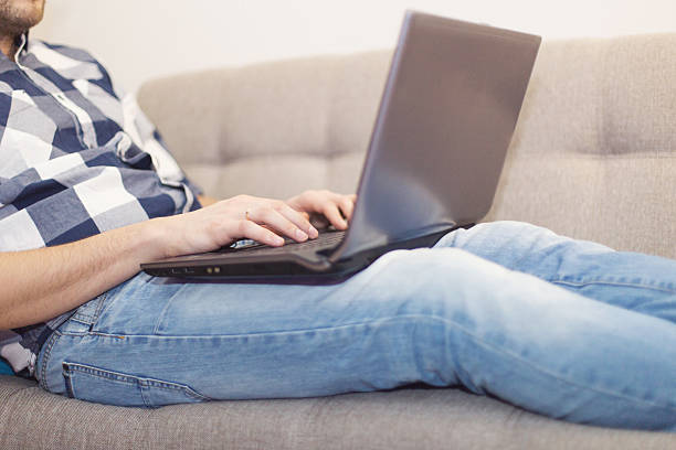 istock the man with a laptop 626807172