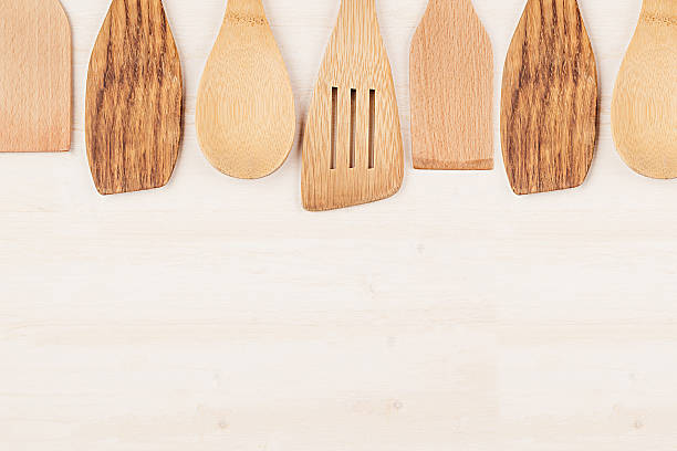istock Design concept  mockup  empty wood beige spoons  white wood background. 626807686