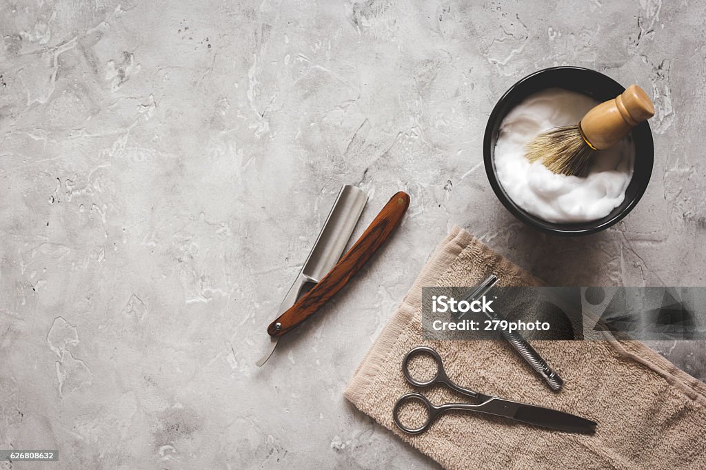 Mens hairdressing desktop with tools for shaving top view Mens hairdressing desktop with tools for shaving top view. Men Stock Photo