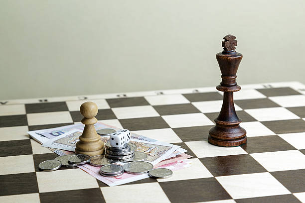istock Dice, money and chessmen 626808692