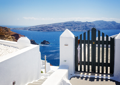 Santorini, Greece- September 20, 2017: Typical whitewashed facade with blue elements in Santorini, Greece.