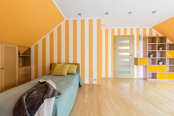 istock Bedroom with striped yellow wall 626812132