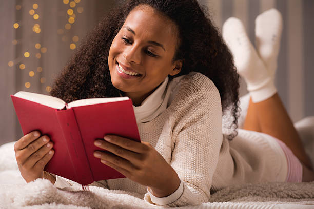 istock Relaxing with her favourite book 626814286