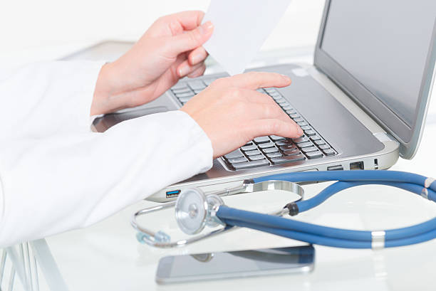 istock Medical doctor typing on laptop 626814808