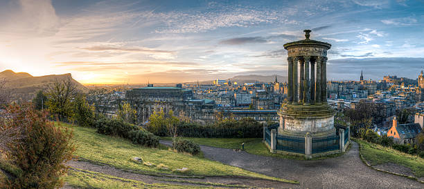 Calton Hill at sunrise Calton HIll pillars at sunrise. Edinburgh, Scotland edinburgh scotland photos stock pictures, royalty-free photos & images