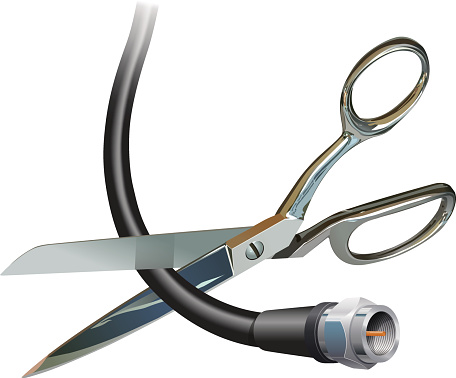 Scissors cutting the cable cord saving money not paying for cable television.,