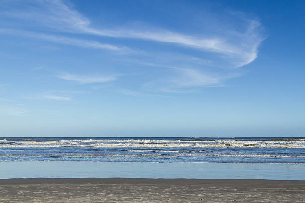 istock Waves and blue sky at Torres beach 626817296
