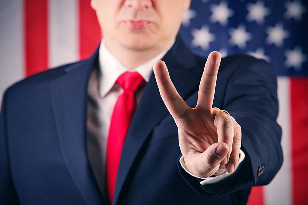istock American Politician Making Peace Sign 626817304