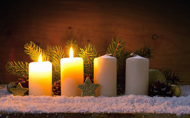 istock Two burning advent candles and Christmas decoration. 626826800