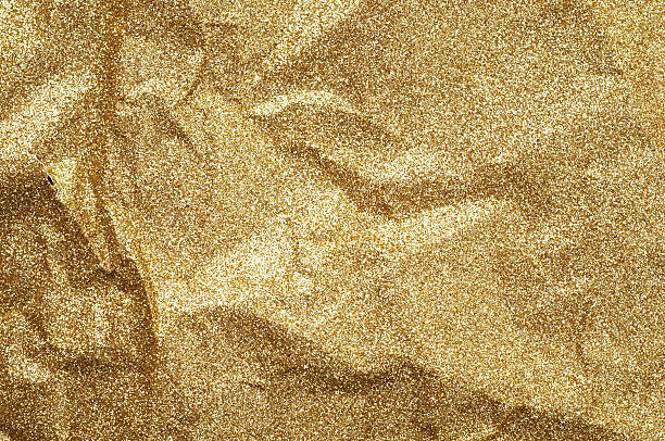 istock Gold wrinkled paper texture abstract background 626827738
