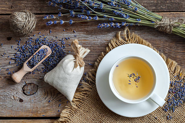 Bunch of lavender flowers, sachets and lavender tea cup.