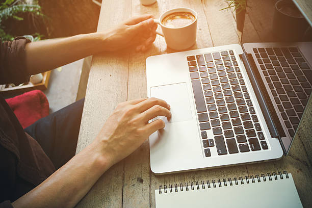 istock Businessman hand use laptop working with notebook vintage tone. 626836756