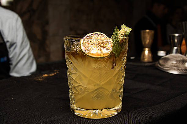 istock Cocktail with lime and ice in a glass 626837792