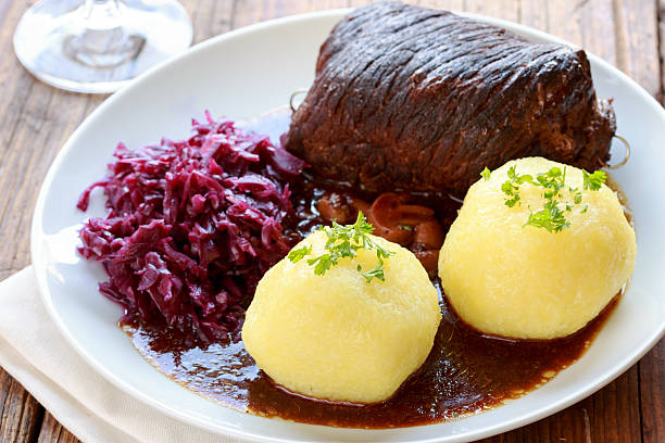 Beef roulade with red cabbage and dumplings stock photo