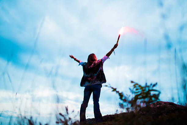 istock Girl with flaming torch 626839914