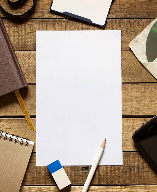 istock Notepaper on wooden background 626840260