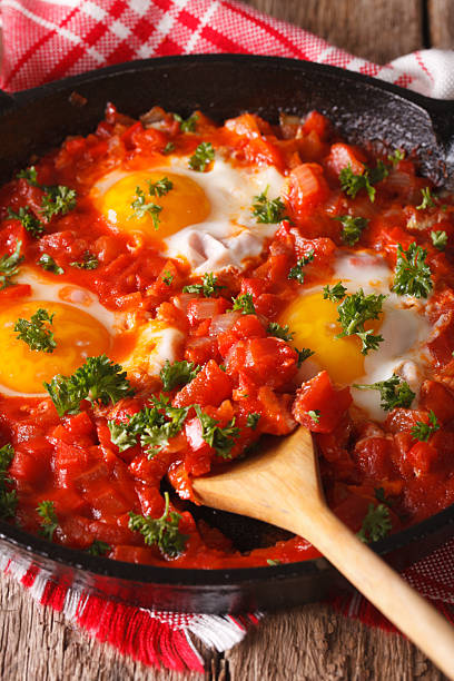 istock shakshuka fried eggs with sauce closeup in a frying pan 626841976