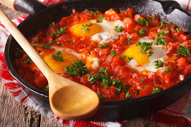 istock Hot breakfast shakshuka in a pan close-up. horizontal 626842216