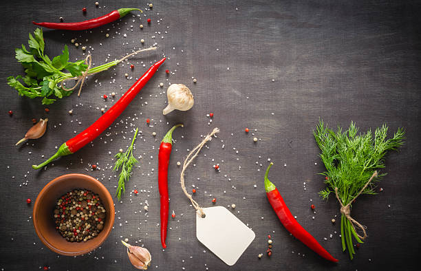 istock Parsley dill pepper and garlic in a dark wooden table 626850608