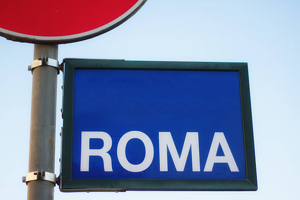 istock Destination ROMA: Blue Bus Stop Sign Reading 