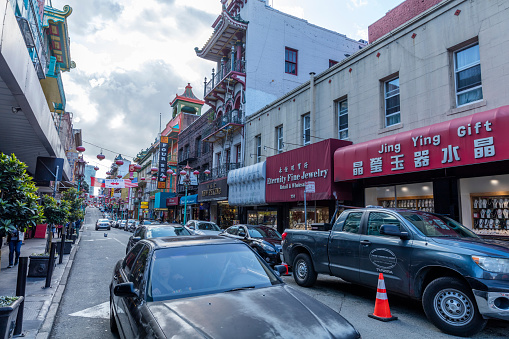San Francisco, California, USA - November 23, 2016: 11mm wide angle View of the chinatown district in San Francisco downtown. Incidental people on the background. 