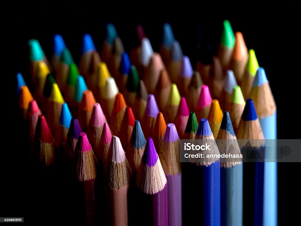 Coloured pencils on black background Brightly coloured pencils against a black backdrop Colored Pencil Stock Photo