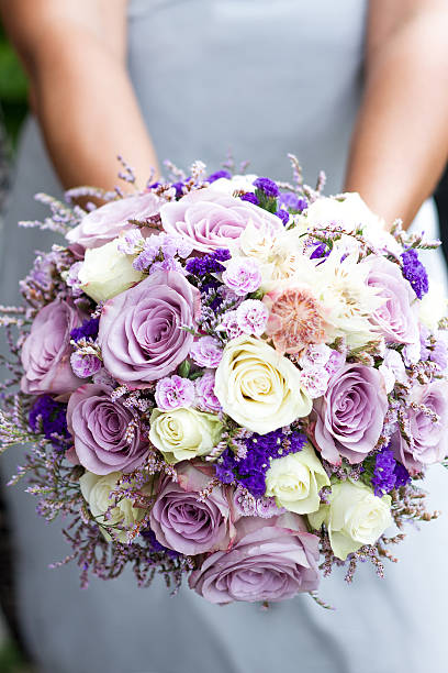 istock Color wedding bouque in brides hands. 626862298