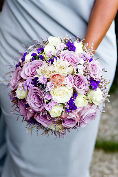 color wedding bouque in brides hands. - poppy purple flower close up imagens e fotografias de stock