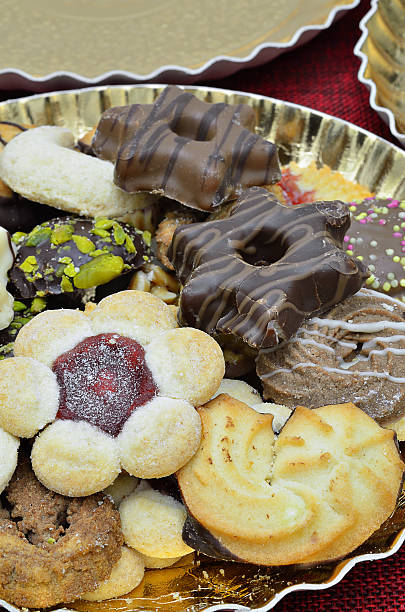 istock Christmas Cookies and Gingerbread on golden Plate 626865502