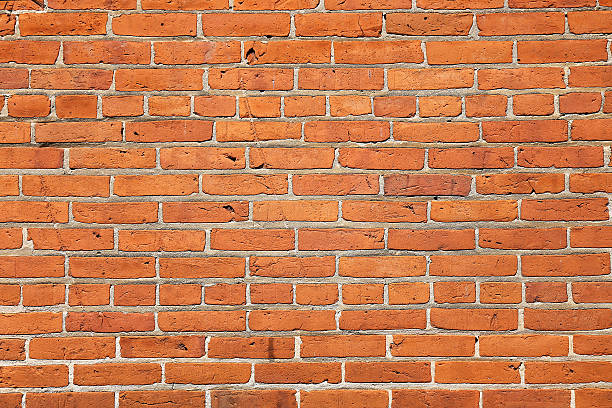 istock Weather Old Orange and Red Brick Wall Background 626866110