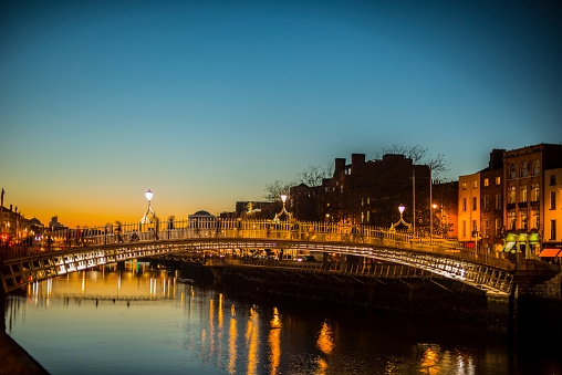 Ha'penny Bridge Dublin at dusk over the river Liffey, Dublin, Ireland.