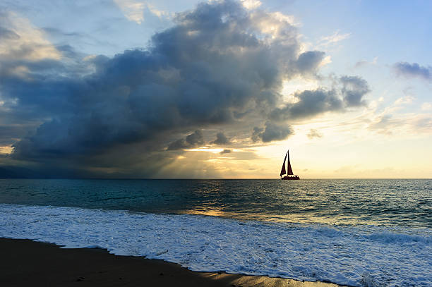 istock Ocean Sunset Sailboat Silhouette 626891240
