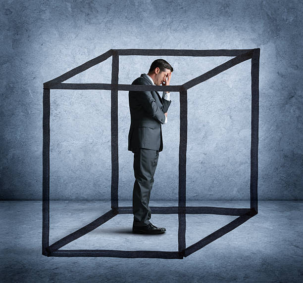 istock Businessman Feeling Like He Is Boxed In 626891578