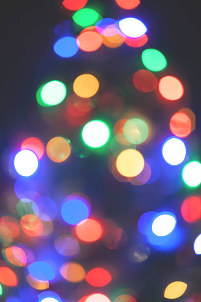 istock Abstract background of light bokeh Christmas tree 626891636