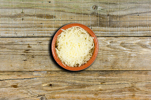 istock grated cheese in a decorative bowl or cup 626901938