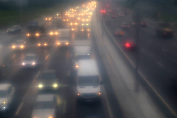 istock Traffic jam on highway in the fog 626902116