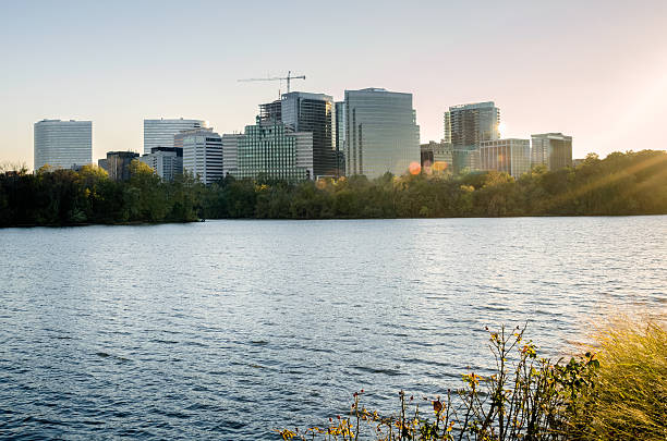 istock Skyline at Sunset with a River in Foreground 626903560
