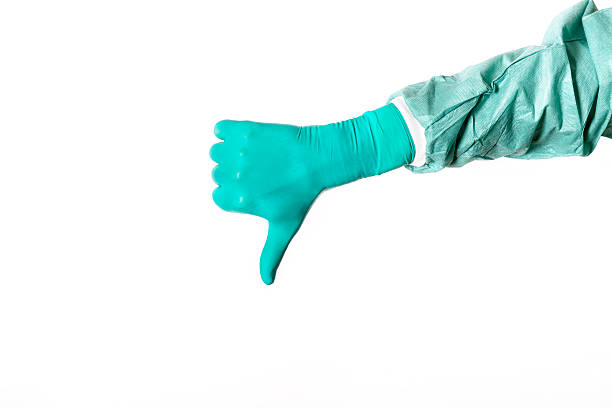 istock Surgical glove is showing thumb down 626906384