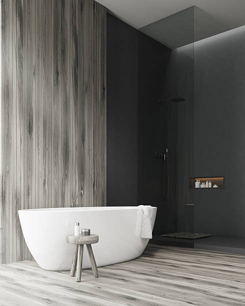 istock bathroom with a tub and a wooden wall 626907322