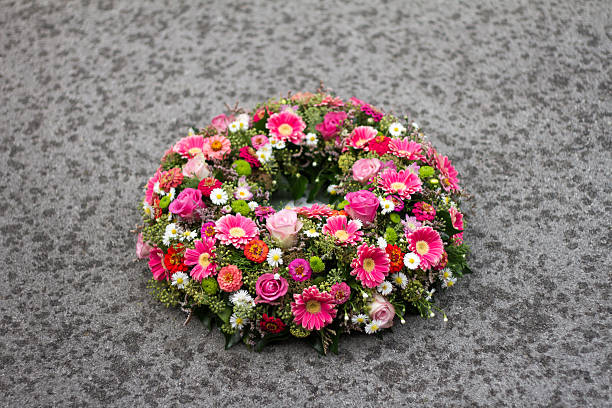 istock Colorful flower arrangement wreath for funerals 626907342