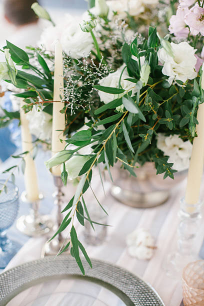 istock Silver candlestick as element of festive table wedding decorations. 626915668